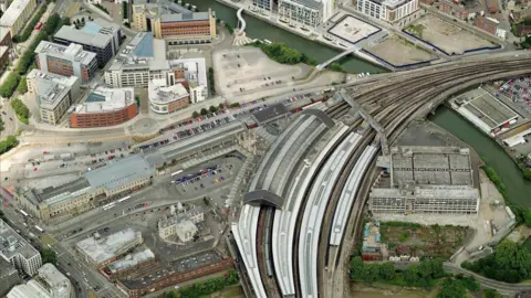 Getty Images An aerial shot of Bristol Temple Meads showing the rail lines going in to the station and nearby pedestrianised areas and office blocks