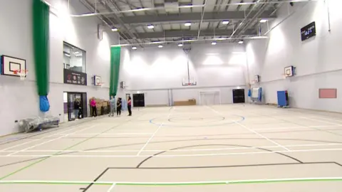 A new sports hall with line markings for a variety of sports. 