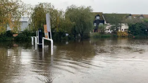 Edd SMith/BBC Flooding at a car park in Potter Heigham