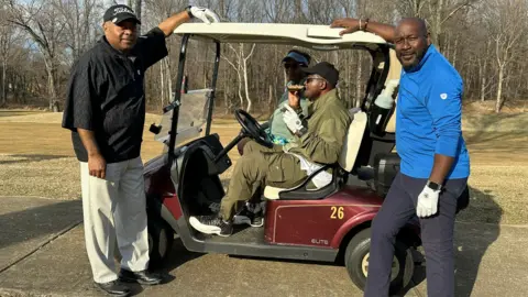 Four members on the golf course at the Woodmore