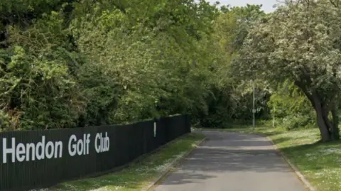 Google Google Maps representation  of tree-lined Hendon Golf Club entrance