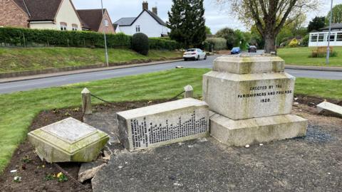 The damaged War Memorial in Maulden, Bedfordshire