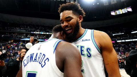 Minnesota Timberwolves players Anthony Edwards and Karl-Anthony Towns