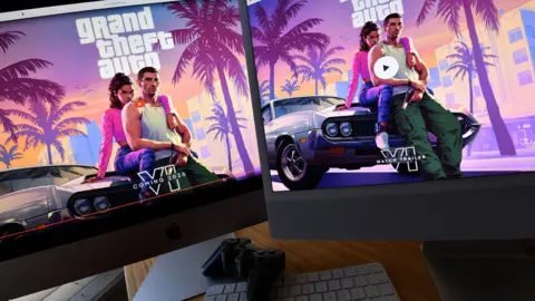 Getty Images Grand Theft Auto VI logo displayed on two computer screens.
