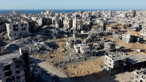 A drone view shows the destruction in a residential neighbourhood in Gaza City