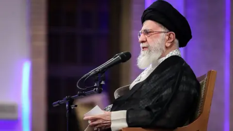A handout photo showing Iran's Supreme Leader, Ayatollah Ali Khamenei, speaking at an event marking the first anniversary of the death of Ebrahim Raisi, in Tehran, Iran (20 May 2025)