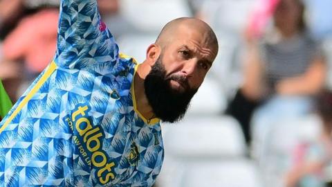 Moeen Ali bowling for the Bears at Trent Bridge on his return