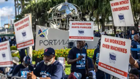 EPA Workers protest outside of a port in Miami 