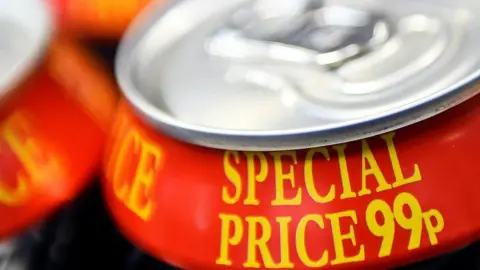 Getty Images A red can with a silver top that says special price 99p