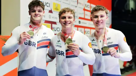 Harry Ledingham-Horn, Matthew Richardson and Harry Radford celebrate with their gold medals