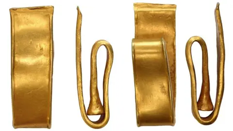 Detailed images of a gold bracelet taken from four angles. The wide bracelet is folded into three and squashed