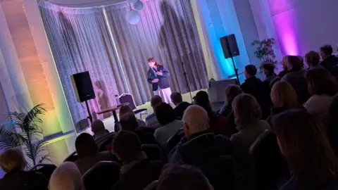 Live at the Lodge A comedian performs at Lutterworth Town Hall as part of the Leicester Comedy Festival