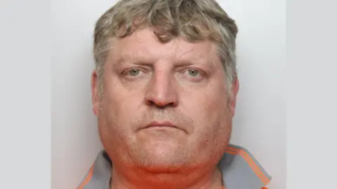 Staffordshire Police A police mugshot depicts a man facing the camera