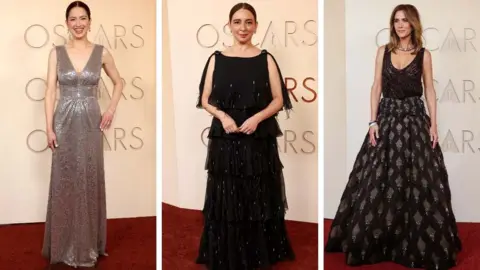 Getty Images Ellie Kemper, Maya Rudolph and Kristen Wiig.