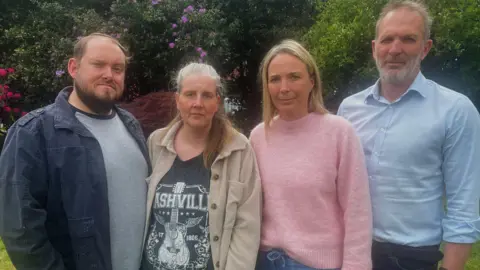 BBC From left, Gary and Sarah Andrews, Sarah and Jack Hawkins
