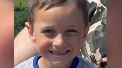 Leicestershire Police An image of five-year-old Timotej Borrett, smiling.