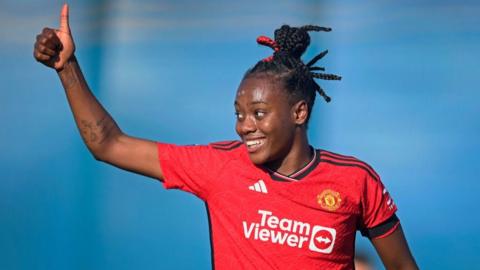 Melvine Malard gives a thumbs up during Man Utd's WSL match against Everton