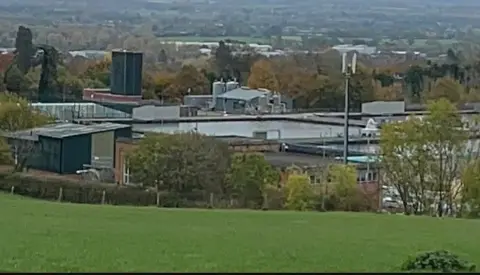 Views of land south of Mount Road in Oswestry show landscape of buildings and green space.