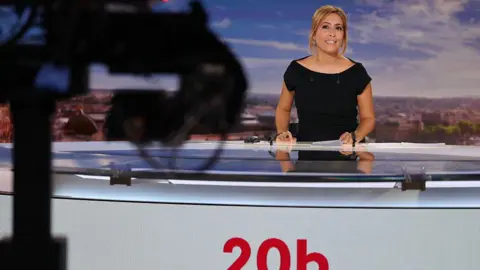 AFP French journalist Lea Salame hosts the evening news broadcast of French television channel France2