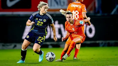 Scotland midfielder Erin Cuthbert and Netherlands midfielder Jackie Groenen play during the match between the Netherlands and Scotland (women) at the Koning Willem II stadium for the UEFA Nations League women season 2024-2025 in Tilburg, Netherlands