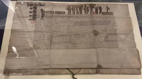 West Norfolk Council Old parchment document in a case 