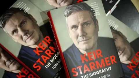 A pile of books entitled Keir Starmer, the biography