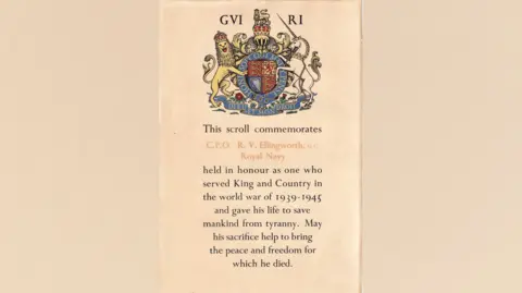 Noonans A commemorative scross reads: CPO R V Ellingworth, Royal Navy. Held in hour as one who served King and Country in the world war of 1939-1945 and gave his life to save mankind from tyranny. May his sacrifice help to bring the peace and freedom for which he died. 