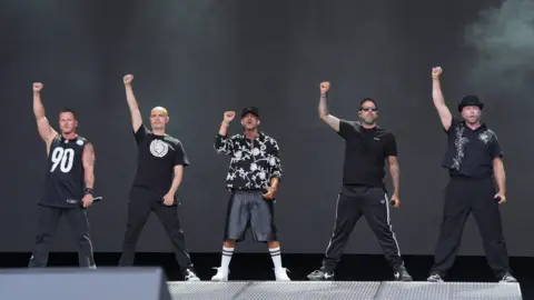 PA Media (left to right) Ritchie Neville, Sean Conlon, Abz Love, Scott Robinson and J Brown of Five performingon stage during Pride on the Park 2026, at Preston Park in Brighton
