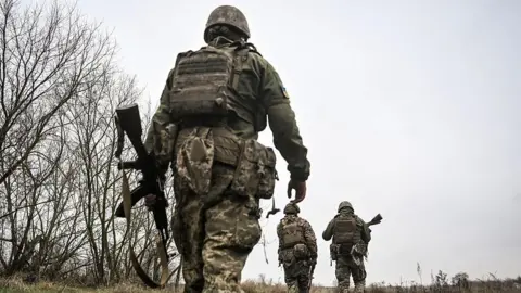 Getty Images Soldiers from the 102nd Samar Wolves Battalion of Ukraine's 108th Territorial Defence Brigade during a training exercise.