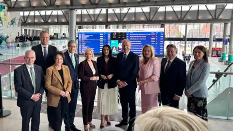 The Taoiseach Micheál Martin was joined by First Minister Michelle O'Neill and Deputy First Minister Emma Little Pengelly for the signing of the contract at the station along with Tanaiste (Irish Deputy PM) Simon Harris