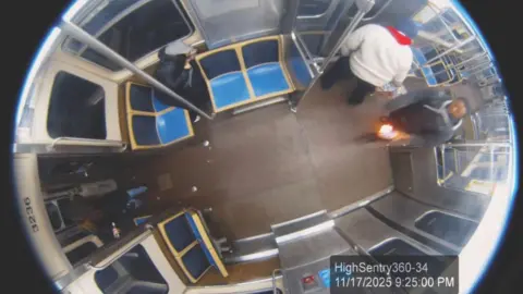 United States District Court Northern District of Illinois Eastern Division The suspect is seen holding a flaming bottle aboard Chicago's public train