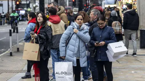 Shoppers on a UK high street