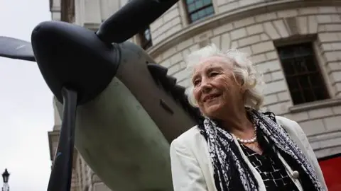Dame Vera Lynn makes an appearance near a replica Spitfire fighter plane at the 70th anniversary of WW2 Battle of Britain.