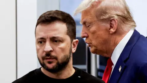 Reuters Donald Trump and Ukraine's President Volodymyr Zelenskiy meet at Trump Tower during the US presidential election campaign in September 2024