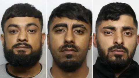 West Yorkshire Police Police mugshots of three men with dark hair and beards. Two are wearing grey sweatshirts, the third man is in a black zipped jumper.