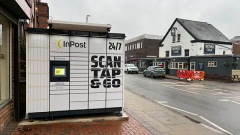 A view looking at the InPost lockers on Main Road, Radcliffe-on-Trent.