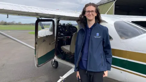 Milo with a plane 