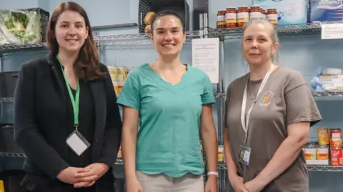 Cheltenham Borough Council Three women in a food pantry in Cheltenham