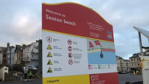 A sign for Seaton beach