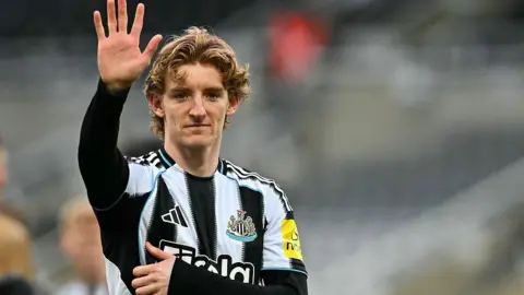 Anthony Gordon waves to Newcastle United supporters after the game against West Ham on 17 May 2026