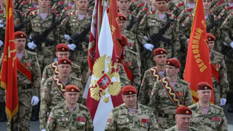 EPA Troops march towards the Red Square to attend the rehearsal of Victory Day military parade marking the 80th anniversary of the victory over Nazi Germany in World War II, at Red Square in Moscow, Russia on May 3, 2025