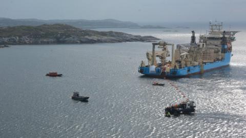 Ship laying new subsea cable