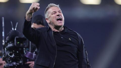 Crawley Town head coach Scott Lindsey celebrates victory at the end of the League Two play-off semi-final between Milton Keynes Dons and Crawley Town
