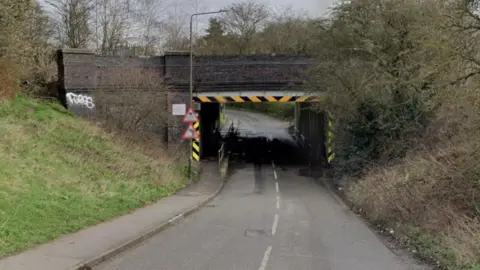 Street view of a bridge on Milnhay Road in Langley Mill, Derbyshire.