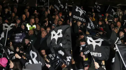 Ospreys fans demonstrating 