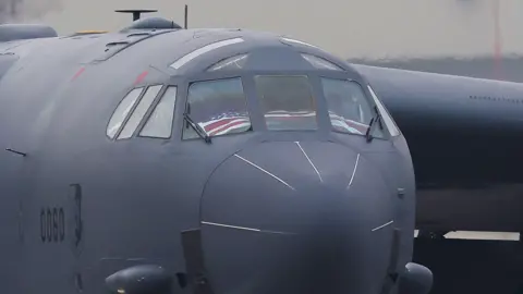 Reuters A U.S. national flag lies in a cockpit of the U.S. Air Force Boeing B-52 Stratofortress as it taxis after landing at RAF Fairford airbase, used by United States Air Force (USAF) personnel, amid the U.S.-Israeli conflict with Iran, in Fairford,