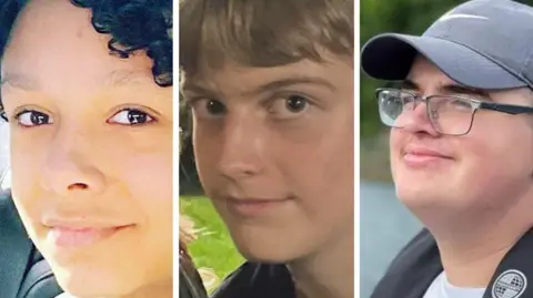 The tightly-cropped faces of three young people, the one on the left has black curly hair, the one in the middle has short blonde hair and the one on the right has a grey cap and glasses