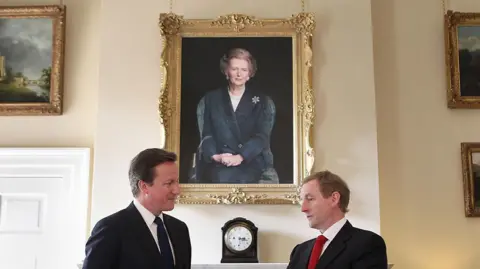 EPA David Cameron and Irish Taoiseach Enda Kenny next to portrait of Margaret Thatcher in 2011