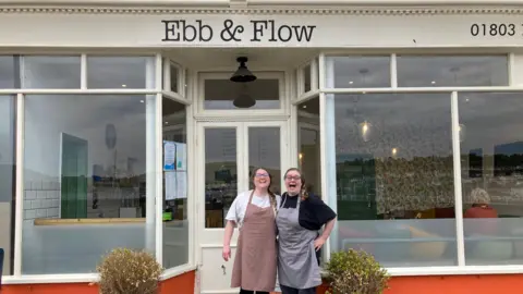 Sian Thomas and Jess Povey outside Ebb and Flow