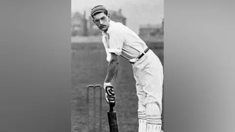 Oundle Town Cricket Club Black and white image of Bertie Grace playing cricket. 